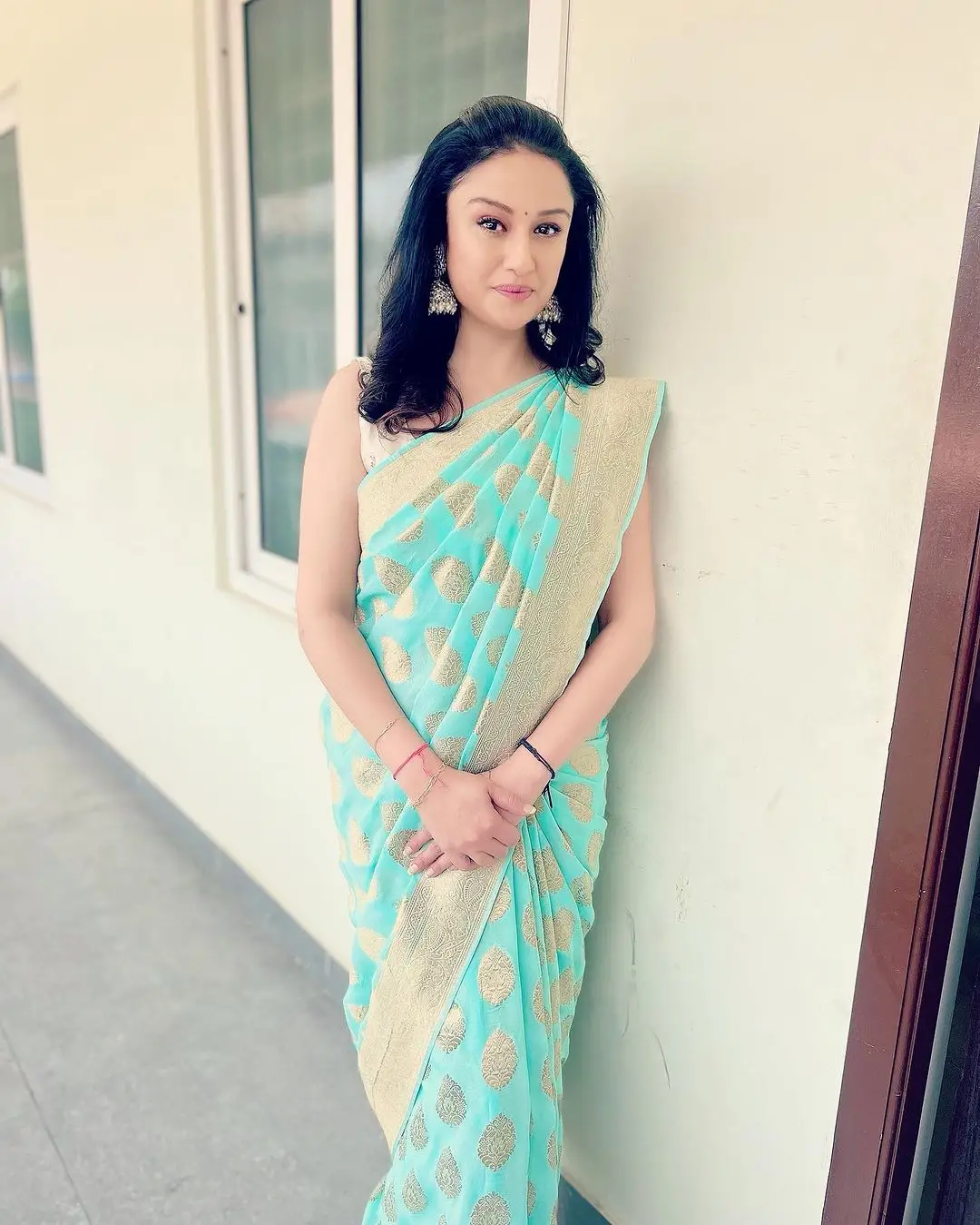 Sonia Agarwal Stills In Blue Saree Sleeveless Blouse